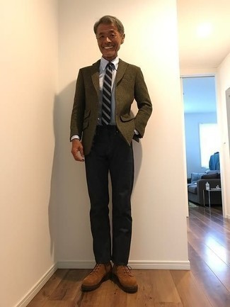 Dark Green Wool Blazer Outfits For Men: This combination of a dark green wool blazer and black chinos looks pulled together and makes you look instantly cooler. And if you want to effortlessly rev up your outfit with a pair of shoes, complement this outfit with a pair of tan suede derby shoes.