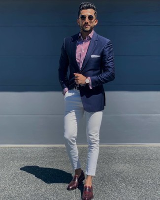 White and Red Vertical Striped Dress Shirt Outfits For Men: For a casually refined look, pair a white and red vertical striped dress shirt with white chinos — these items play nicely together. Add burgundy leather loafers to the equation to instantly ramp up the classy factor of your outfit.