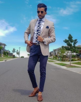 Navy Floral Tie Outfits For Men: For rugged elegance with a modern finish, reach for a beige blazer and a navy floral tie. If you're puzzled as to how to finish, add a pair of brown leather tassel loafers.