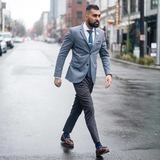 Navy Print Socks Outfits For Men: For an ensemble that provides function and dapperness, marry a light blue blazer with navy print socks. Finishing with a pair of brown leather tassel loafers is a surefire way to bring some extra polish to this outfit.