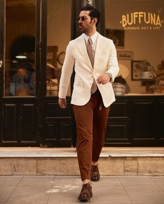 Tobacco Leather Derby Shoes Outfits: Opt for a beige blazer and brown chinos to don a neat and sophisticated outfit. On the fence about how to finish your outfit? Finish off with tobacco leather derby shoes to amp up the fashion factor.