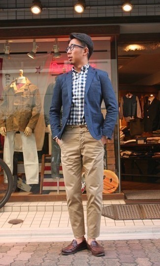 Navy Blazer Outfits For Men: This smart combination of a navy blazer and khaki chinos is very easy to throw together without a second thought, helping you look awesome and prepared for anything without spending too much time combing through your wardrobe. A pair of brown leather loafers effortlessly ups the fashion factor of any outfit.