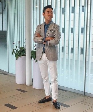 Blue Dress Shirt Outfits For Men: This semi-casual combo of a blue dress shirt and white chinos is capable of taking on different nuances depending on the way you style it out. A trendy pair of black leather loafers is an effective way to bring an extra dose of class to your ensemble.