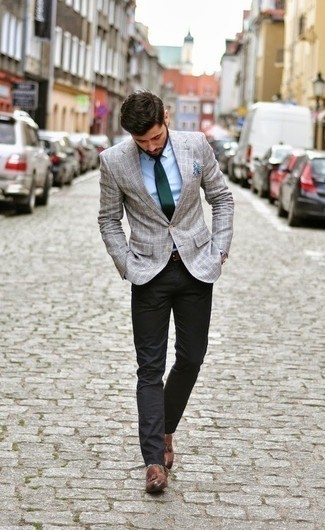 Grey Check Blazer Outfits For Men: A grey check blazer and black chinos worn together are a match made in heaven for those who love semi-casual styles. Up the wow factor of this outfit by sporting a pair of brown leather tassel loafers.