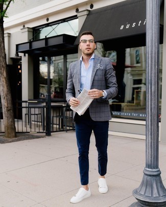 Grey Check Blazer Outfits For Men: This combo of a grey check blazer and navy chinos comes to rescue when you need to look effortlessly elegant in a flash. Want to play it down with shoes? Add white canvas low top sneakers to the mix for the day.
