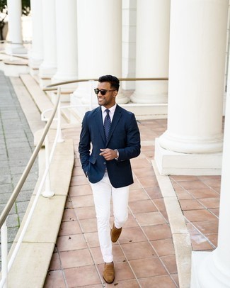 Blue Polka Dot Tie Outfits For Men: This sophisticated combo of a navy blazer and a blue polka dot tie will hallmark your sartorial prowess. When not sure as to what to wear in the shoe department, complement your outfit with a pair of brown suede loafers.