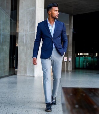 Navy Leather Loafers Outfits For Men: This combo of a navy blazer and grey chinos looks put together and instantly makes you look seriously stylish. For extra fashion points, complement your getup with a pair of navy leather loafers.
