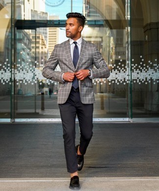 Navy Tie Outfits For Men: We're loving how this pairing of a grey plaid blazer and a navy tie instantly makes any gentleman look refined and sharp. Black leather loafers will be a stylish addition for this getup.