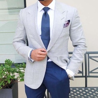 Blue Polka Dot Tie Outfits For Men: Marrying a grey blazer with a blue polka dot tie is an on-point choice for a sharp and classy look.
