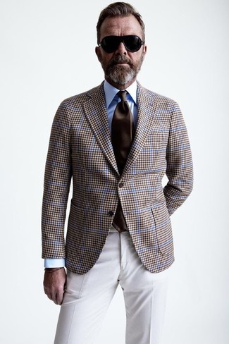 Brown Houndstooth Blazer Outfits For Men: We're loving how this pairing of a brown houndstooth blazer and white dress pants instantly makes men look refined and sharp.