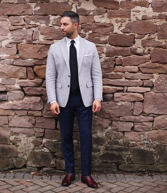 Grey Blazer with Blue Dress Pants Outfits For Men: Flaunt your elegant side by wearing a grey blazer and blue dress pants. All you need is a great pair of burgundy leather loafers to complement this outfit.