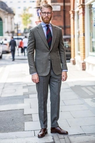 Burgundy Horizontal Striped Tie Outfits For Men: We love the way this combo of a grey wool blazer and a burgundy horizontal striped tie immediately makes any man look stylish and elegant. Dark brown leather derby shoes are a stylish complement to this look.