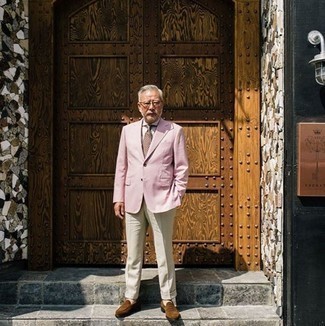 Pink Blazer Outfits For Men: Pairing a pink blazer with beige dress pants is a smart pick for a dapper and polished look. If not sure as to the footwear, go with brown suede loafers.