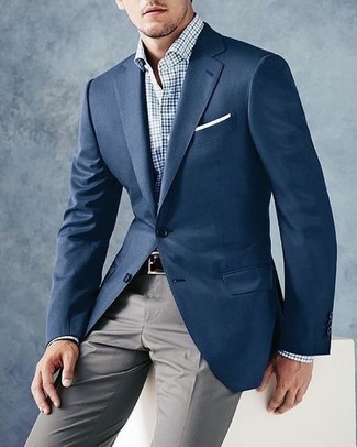 White and Navy Gingham Dress Shirt Outfits For Men: This pairing of a white and navy gingham dress shirt and grey dress pants is a fail-safe option when you need to look really dapper and refined.