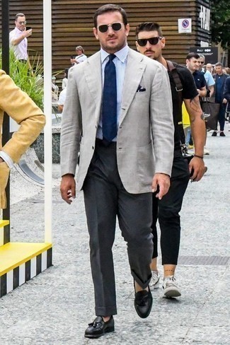 Grey Blazer Dressy Outfits For Men: This outfit demonstrates that it pays to invest in such smart menswear items as a grey blazer and charcoal dress pants. If you're hesitant about how to finish, introduce black leather tassel loafers to the mix.