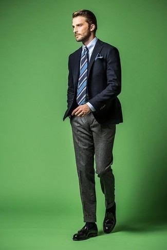 Charcoal Wool Dress Pants Summer Outfits For Men: Putting together a navy blazer with charcoal wool dress pants is a wonderful choice for a classic and classy look. Let your styling sensibilities truly shine by finishing off this ensemble with black leather tassel loafers. A great summer option, you can sport this look throughout the summer.