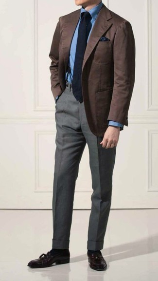 Navy Tie Outfits For Men: A brown blazer and a navy tie make for the ultimate polished outfit. Rock a pair of dark purple leather tassel loafers and the whole ensemble will come together perfectly.