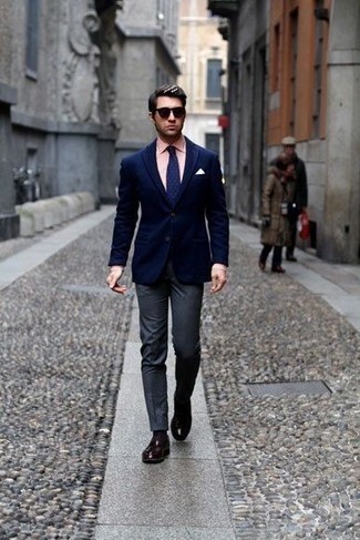 Navy Blazer Dressy Outfits For Men: For rugged elegance with a clear fashion twist, you can easily go for a navy blazer and charcoal dress pants. Dark brown leather tassel loafers are a welcome companion for this look.