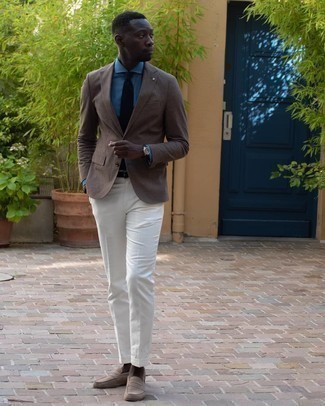 Beige Suede Loafers Outfits For Men: This sophisticated combination of a brown blazer and white dress pants is a popular choice among the stylish gents. This look is completed nicely with beige suede loafers.