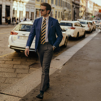 Navy Blazer Dressy Outfits For Men: You'll be amazed at how extremely easy it is to get dressed this way. Just a navy blazer and charcoal dress pants. Complete your ensemble with black leather double monks and ta-da: this ensemble is complete.