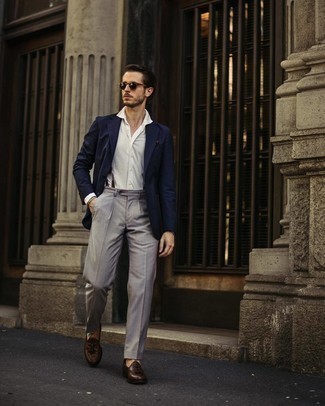 Navy Blazer Dressy Outfits For Men: Opt for a navy blazer and grey dress pants and you're guaranteed to make a sartorial statement. The whole getup comes together when you add dark brown leather tassel loafers to your outfit.