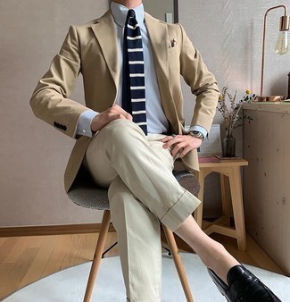 Beige Dress Pants Outfits For Men: Hard proof that a tan blazer and beige dress pants look amazing when you pair them in a sophisticated look for a modern gent. A pair of black leather loafers is a savvy pick to finish your outfit.