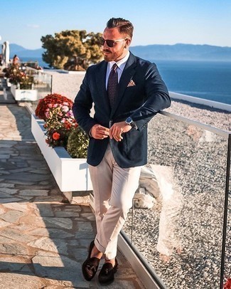 Beige Dress Pants Outfits For Men: This classy pairing of a navy blazer and beige dress pants is a must-try getup for any modern guy. Let your sartorial sensibilities really shine by completing your outfit with dark brown suede tassel loafers.
