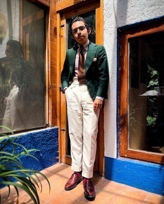 Dark Green Blazer Outfits For Men: This sophisticated combo of a dark green blazer and white dress pants is a favored choice among the sartorially superior men. Introduce burgundy leather loafers to the mix for extra style points.