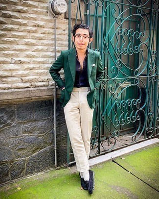 Dark Green Blazer Outfits For Men: Pair a dark green blazer with beige dress pants to look nice and classic. If you're on the fence about how to finish, complement your ensemble with navy velvet loafers.