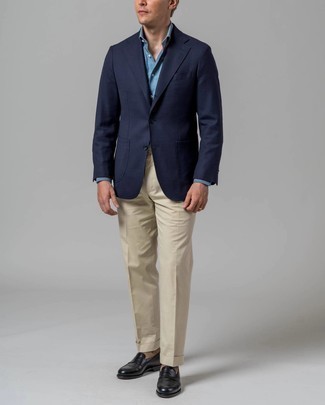 Navy Blazer Dressy Outfits For Men: We're loving the way this combo of a navy blazer and beige dress pants instantly makes a man look classy and sharp. Let your styling expertise truly shine by complementing this ensemble with a pair of black leather loafers.