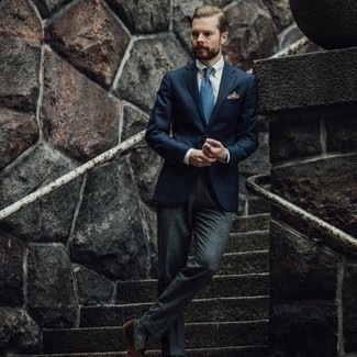 Blue Tie Outfits For Men: Marrying a navy blazer and a blue tie is a fail-safe way to infuse your wardrobe with some masculine sophistication. If you wish to effortlessly dial down this getup with shoes, add a pair of brown suede loafers to the mix.