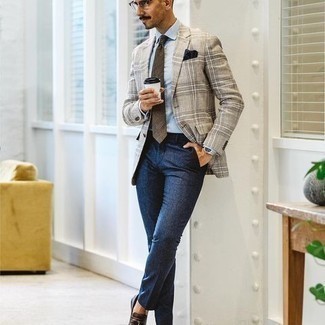 Beige Plaid Blazer Outfits For Men: This combo of a beige plaid blazer and navy dress pants is ideal when you need to look like a connoisseur of modern men's fashion. When it comes to footwear, this ensemble pairs really well with dark brown leather tassel loafers.