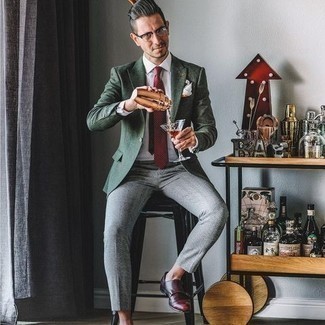 Dark Green Blazer Outfits For Men: A dark green blazer looks so elegant when paired with grey dress pants in a modern man's combo. A pair of burgundy leather double monks looks perfect here.