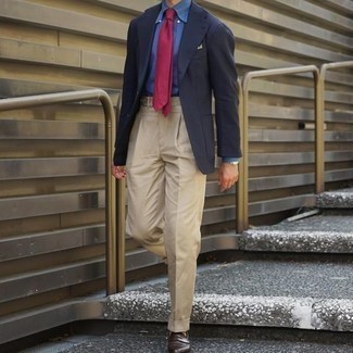 Red Tie Outfits For Men: Indisputable proof that a navy blazer and a red tie look amazing when paired together in a polished outfit for a modern gent. Dial up this whole look by sporting a pair of dark brown leather loafers.