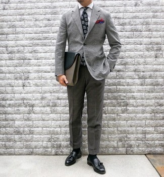 Charcoal Dress Pants Outfits For Men: This combo of a white and black houndstooth blazer and charcoal dress pants is great for dressier situations. If you're puzzled as to how to round off, a pair of black leather tassel loafers is a smart choice.