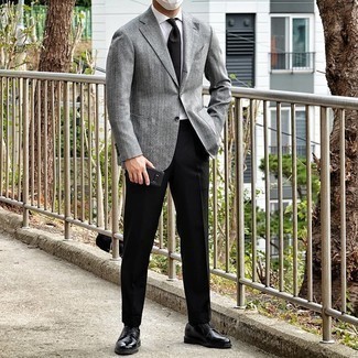 Charcoal Wool Blazer Outfits For Men: Combining a charcoal wool blazer with black dress pants is a great idea for a stylish and classy look. For extra fashion points, complement this outfit with a pair of black leather derby shoes.
