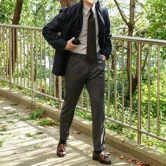 Navy Blazer Summer Outfits For Men: Pairing a navy blazer and charcoal dress pants will hallmark your sartorial expertise. If not sure about the footwear, complement this outfit with brown leather tassel loafers. No doubt, it's easier to work through a baking hot summer afternoon in a fresh look like this one.