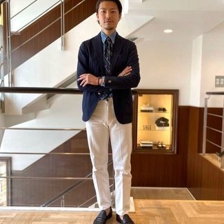 Navy Blazer Summer Outfits For Men: Consider wearing a navy blazer and white dress pants for rugged sophistication with a fashionable spin. If in doubt as to the footwear, enter black leather loafers into the equation. You can bet this ensemble is great come super hot summer days.