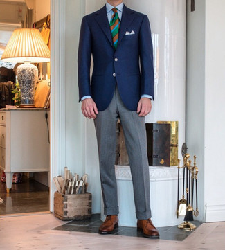 Green Tie Outfits For Men: One of the most elegant ways to style out such a hard-working menswear item as a navy blazer is to combine it with a green tie. Feeling experimental? Switch up this look by slipping into a pair of brown leather desert boots.