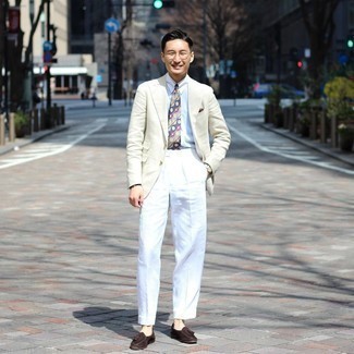 Multi colored Print Tie Outfits For Men: You're looking at the definitive proof that a beige blazer and a multi colored print tie look awesome when matched together in a sophisticated getup for a modern gent. If not sure about the footwear, go with a pair of dark brown suede tassel loafers.