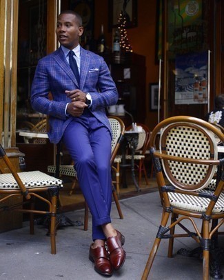 Blue Dress Pants Outfits For Men: Consider pairing a navy plaid blazer with blue dress pants for a classic and refined silhouette. Now all you need is a pair of burgundy leather double monks.