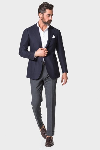 Dark Brown Leather Tassel Loafers Outfits: You'll be amazed at how easy it is to get dressed like this. Just a navy blazer married with charcoal dress pants. Enter dark brown leather tassel loafers into the equation and off you go looking boss.