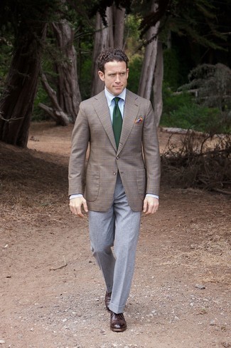 Charcoal Wool Dress Pants Summer Outfits For Men: Opt for a brown plaid blazer and charcoal wool dress pants and you'll look like a true style expert. Tap into some David Gandy stylishness and introduce dark brown leather oxford shoes to the equation. We're loving how ideal this getup is come summer.