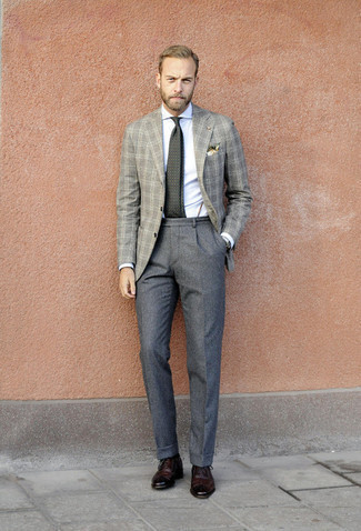 Grey Wool Dress Pants Outfits For Men: Teaming a grey plaid blazer and grey wool dress pants is a surefire way to infuse your styling repertoire with some rugged sophistication. Add dark brown leather brogues to the equation et voila, your outfit is complete.