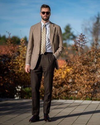 Beige Print Tie Outfits For Men: A tan herringbone wool blazer and a beige print tie are absolute essentials if you're crafting a classic wardrobe that holds to the highest men's fashion standards. Introduce a pair of dark brown leather loafers to your look and the whole look will come together.