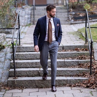 Tobacco Polka Dot Tie Outfits For Men: This polished combo of a navy blazer and a tobacco polka dot tie is a frequent choice among the fashion-forward men. When it comes to shoes, this getup pairs nicely with dark brown leather loafers.