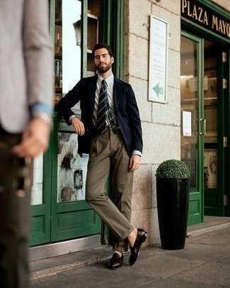 Navy and Green Horizontal Striped Tie Outfits For Men: This pairing of a navy blazer and a navy and green horizontal striped tie is a real lifesaver when you need to look like a refined gent. Introduce a pair of dark brown leather loafers to the equation and the whole outfit will come together.