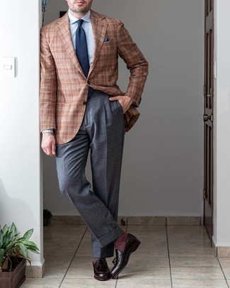 Dark Brown Leather Tassel Loafers Outfits: Pair a brown plaid blazer with grey dress pants to have all eyes on you. When it comes to shoes, complement this outfit with a pair of dark brown leather tassel loafers.