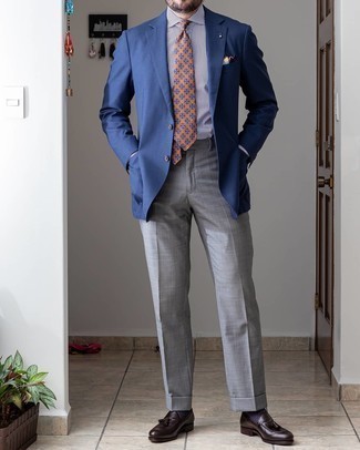 Navy Blazer Outfits For Men: This polished combo of a navy blazer and grey dress pants is a popular choice among the dapper chaps. On the shoe front, this look pairs really well with dark brown leather tassel loafers.
