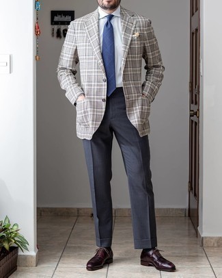 Navy Check Tie Outfits For Men: Marrying a grey plaid blazer with a navy check tie is a nice pick for a stylish and sophisticated look. A pair of burgundy leather derby shoes can integrate brilliantly within many getups.